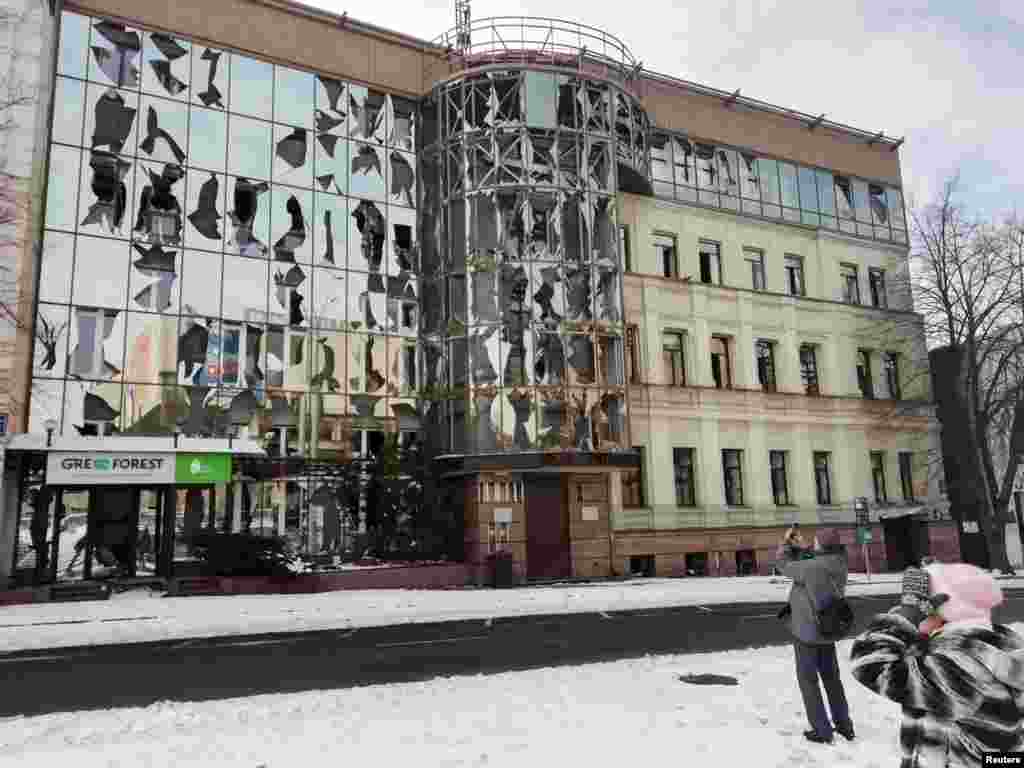 A view shows buildings damaged by recent Russian shelling in Kharkiv, March 8, 2022.