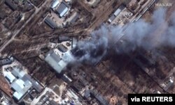 A Satellite Image Shows A Close-Up View Of Fires In An Industrial Area, In Chernihiv, Amid Southern Russia'S Invasion Of Ukraine, March 10, 2022. (Satellite Image ©2022 Maxar Technologies/Handout Via Reuters)