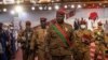 FILE - Lieutenant-Colonel Paul-Henri Sandaogo Damiba, President of Burkina Faso, arrives to his inauguration ceremony as President of Transition, in Ouagadougou, on March 2, 2022. 