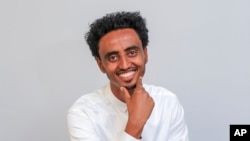 ጋዜጠኛ ኣሚር ኣማን ኪያሮ