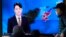 People watch a TV report on North Korea's missile launch at the Seoul Railway Station in Seoul, South Korea, March 5, 2022.