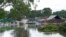 Buildings are surrounded by flood waters in Londonderry on the outskirts of Sydney, Australia, March 3, 2022.