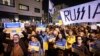 People protest against the Russian invasion of Ukraine, outside the Russian Embassy in Tel Aviv, March 5, 2022.