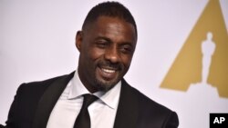 Idris Elba poses in the press room at the Oscars on Sunday, Feb. 22, 2015, at the Dolby Theatre in Los Angeles.