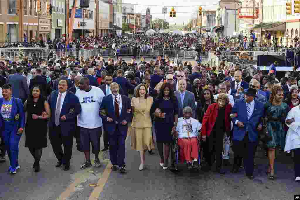 Vice President Kamala Harris marches on the Edmund Pettus Bridge after speaking in Selma, Alabama, on the anniversary of &quot;Bloody Sunday,&quot; a landmark event of the civil rights movement, March 6, 2022.