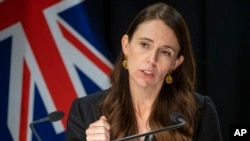New Zealand Prime Minister Jacinda Ardern gestures during the post-Cabinet press conference in Wellington, New Zealand, Monday, March 7, 2022. (Mark Mitchell/Pool Photo via AP)