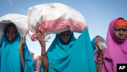 Somalis who fled drought-stricken areas arrive at a makeshift camp on the outskirts of the capital Mogadishu, Somalia, Feb. 4, 2022. 