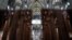 FILE - An empty Duomo is seen during the coronavirus outbreak, in Milan, Italy, March 5, 2020. 