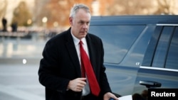 FILE - Then-U.S. Secretary of the Interior Ryan Zinke arrives at the U.S Capitol in Washington, Dec. 3, 2018. 