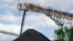 FILE - Coal is dumped onto a stack at a mine near in Muswellbrook in the Hunter Valley, Australia, Nov. 2, 2021. 