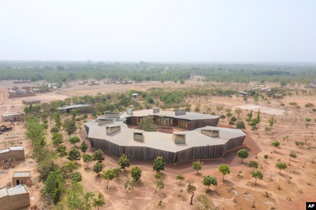 This image released by the Pritzker Prize shows the Lycée Schorge in Burkina Faso. The Pritzker Architecture Prize has been awarded to its designer, Berlin-based architect Diébédo Francis Kéré. (Francis Kéré via AP)