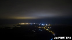 FILE - An aerial view shows the Olkiluoto nuclear power plant area in Eurajoki, Finland, Dec. 10, 2020.