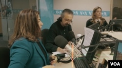 VOA Afghan service journalists (from L - R) Noshaba Ashna, Hafiz Assefi and Roya Zamani on the air at VOA headquarters in Washington, DC.