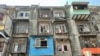 High Rises Buildings Go up in Mumbai's Old Tenement Neighborhood
