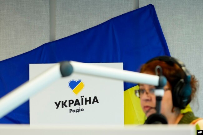 Natalia Churikova, editor in chief of Radio Ukraine, is seen at its studio in Prague, Czech Republic, March 31, 2022. (AP Photo/Petr David Josek)