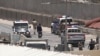 Police officers work in Mogadishu, Somalia, March 23, 2022, in this still image obtained from a social media video. (Twitter/@Hajishire/via Reuters)