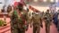 Le lieutenant-colonel Paul-Henri Sandaogo Damiba, président du Burkina Faso, quitte sa cérémonie d'investiture après avoir été investi président de la Transition, à Ouagadougou, le 2 mars 2022.