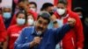 El presidente de Venezuela, Nicolás Maduro, se dirige a la multitud durante un mitin del gobierno para conmemorar el Día de la Juventud, en Caracas, Venezuela, el 12 de febrero de 2022. REUTERS/Leonardo Fernandez Viloria