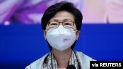 Hong Kong Chief Executive Carrie Lam listens to reporters' questions during a news conference in Hong Kong, China, March 21, 2022. 