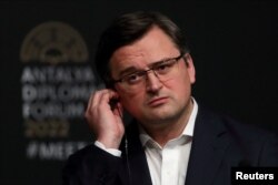 FILE - Ukrainian Foreign Minister Dmytro Kuleba attends a news conference, in Antalya, Turkey March 10, 2022.