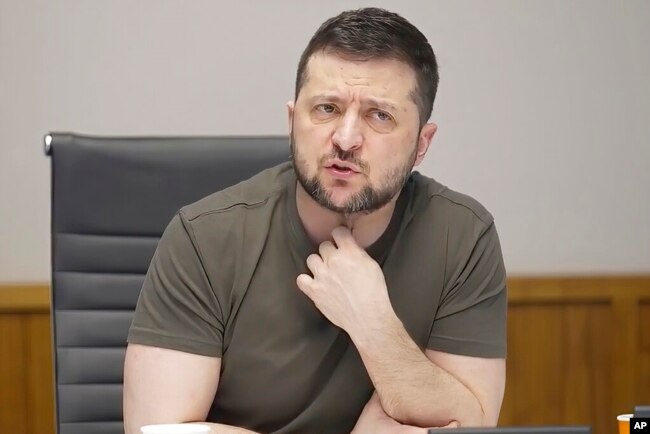 In this image from video provided by the Ukrainian Presidential Press Office, Ukrainian President Volodymyr Zelenskyy speaks during an interview with independent Russian news media from Kyiv, Ukraine, March 27, 2022.