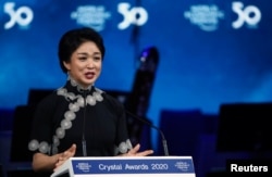 FILE - Chinese dancer and TV star Jin Xing speaks during the opening of the 50th World Economic Forum in Davos, Switzerland, Jan. 20, 2020.