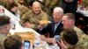 President Joe Biden visits with members of the 82nd Airborne Division at the G2A Arena, in Jasionka, Poland.