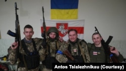 Belarusian fighters of the Kastus Kalinouski battalion pose for a photo in Kyiv, March 2022. (Courtesy: Antos Tsialezhnikau)