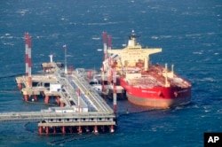 FILE - A tanker is anchored at an oil export terminal in the far eastern port of Kozmino, Russia, Dec. 28, 2009.