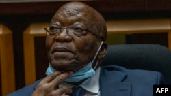 FILE: Former South African President Jacob Zuma sits in the High Court in Pietermaritzburg, South Africa, on January 31, 2022. - Zuma sought then to appeal Judge Piet Koen decision to keep State prosecutor Billy Downer on the case. Koen decided later to recuse himself. 