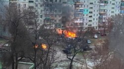 Fire is seen in Mariupol at a residential area after shelling amid Russia's invasion of Ukraine March 3, 2022, in this image obtained from social media. Twitter @AyBurlachenko via REUTERS