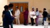 FILE - People line up to vote on Election Day at Martin Luther King Jr. Elementary School, in the Lower Ninth Ward of New Orleans, Nov. 3, 2020.