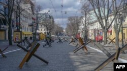 Anti-tank obstacles are seen in a street of Odesa, Ukraine, March 13, 2022.