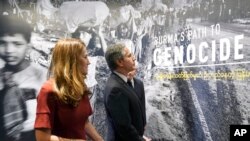 FILE - Secretary of State Antony Blinken tours the "Burma's Path to Genocide" exhibit at the United States Holocaust Memorial Museum, March 21, 2022, in Washington.