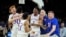 Kansas celebrates after their win against North Carolina in a college basketball game at the finals of the Men's Final Four NCAA tournament, Monday, April 4, 2022, in New Orleans. (AP Photo/Brynn Anderson)