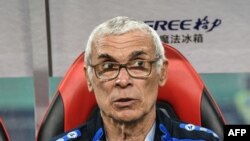 Moyi Argentine Hector Cuper, entraineur ya ba Léopards ya RDC, awa azalaki kokamba Uruguay na match na Uzbekistan na Coupe du monde na Guancxi, Chine, 22 mars 2019. 