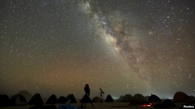 FILE - The Milky Way galaxy is seen in the night sky in the White Desert north of the Farafra Oasis southwest of Cairo May 16, 2015. (REUTERS/Amr Abdallah Dalsh/File)