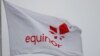 FILE - Equinor's flag flutters next to the company's headqurters in Stavanger, Norway, Dec. 5, 2019.