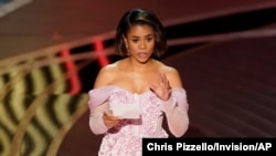 Host Regina Hall speaks at the Oscars on Sunday, March 27, 2022, at the Dolby Theatre in Los Angeles.