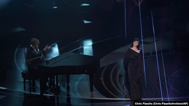 Finneas O'Connell left, and Billie Eilish perform "No Time To Die" from "No Time To Die" at the Oscars on Sunday, March 27, 2022.