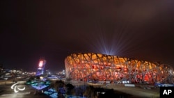 General view of the Beijing National Stadium lit up during the closing ceremony at the Beijing National Stadium Beijing 2022 Winter Paralympic Games in Beijing, China, March 13, 2022.