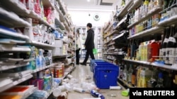 Scattered goods caused by an earthquake are seen at a convenience store in Sendai, Miyagi prefecture, Japan, March 17, 2022, in this photo taken by Kyodo. (Kyodo/via Reuters)
