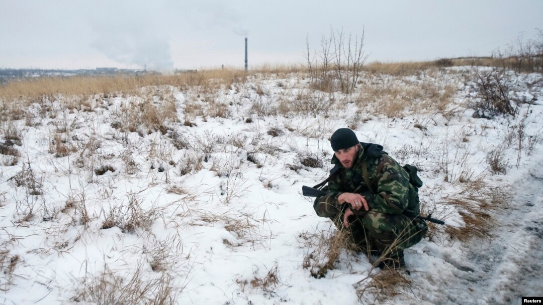 FILE - A pro-Russian separatist from the Chechen "Death" battalion is seen in the self-proclaimed Donetsk People's Republic, eastern Ukraine, Dec. 8, 2014. So far, the U.S. is not seeing any foreign mercenaries supporting Russia's war effort in Ukraine.