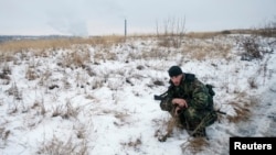 FILE - A pro-Russian separatist from the Chechen "Death" battalion is seen in the self-proclaimed Donetsk People's Republic, eastern Ukraine, Dec. 8, 2014. So far, the U.S. is not seeing any foreign mercenaries supporting Russia's war effort in Ukraine.