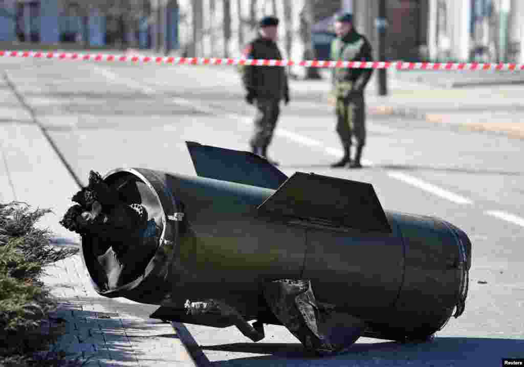 A fragment of a missile is seen in the street after shelling in the separatist-controlled city of Donetsk, Ukraine, March 14, 2022.