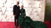 Will Smith (kiri) dan Jada Pinkett Smith tiba di Dolby Theatre, Los Angeles pada malam anugerah Oscar, Minggu, 27 Maret 2022.. (Foto oleh Jordan Strauss/Invision/AP)