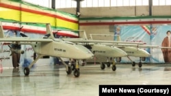 Iranian Mohajer-6 drones can be seen on display in Iran in this photo published by state news agency Mehr in 2018. (Mehr News)