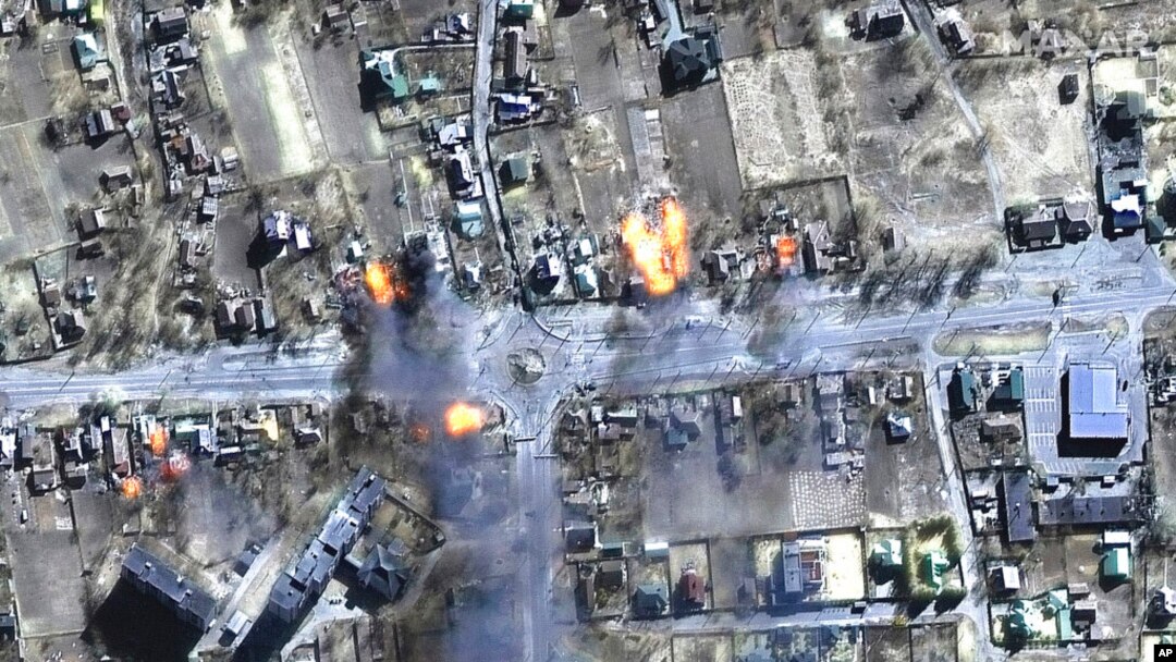 This satellite image provided by Maxar Technologies shows burning buildings in a residential area in northeast Chernihiv, Ukraine, on March 16, 2022.