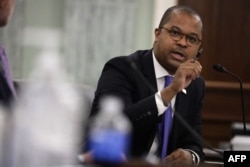 FILE - FCC Commissioner Geoffrey Starks testifies during an oversight hearing to examine the Federal Communications Commission, in Washington, June 24, 2020.