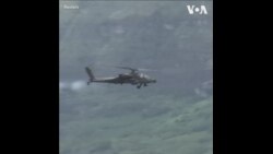 美菲军队在“肩并肩”联合军演中进行实弹演习 